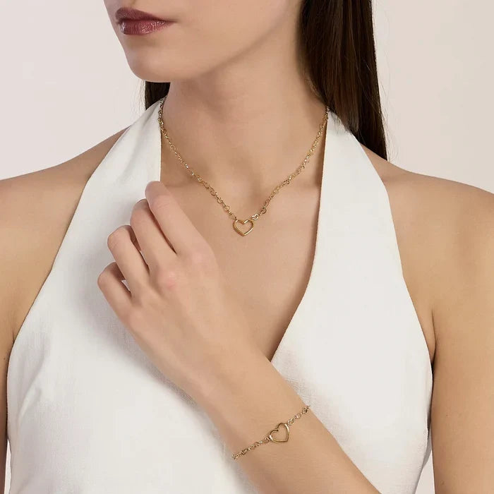 Pulseira de coração em aço dourado