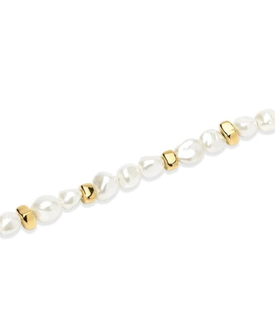 Pulseira dourada com pérolas de concha