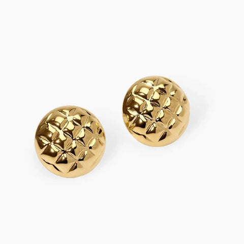 Brincos em aço dourado matelassé
