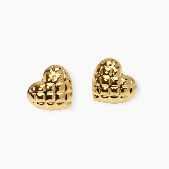 Brincos coração em aço dourado matelassé